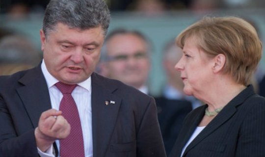 Poroşenko və Merkel Donbasdakı vəziyyəti müzakirə ediblər