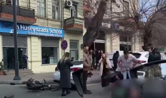 Bakıda ağır qəza: Avtomobil motosikletçini bir neçə metr irəli tullayıb - VİDEO