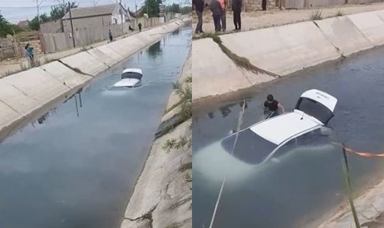 Saray qəsəbəsində avtomobil su kanalına düşüb - VİDEO