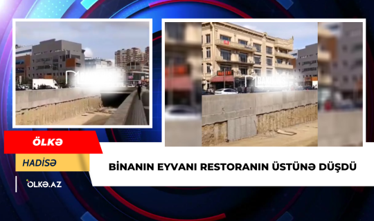 Binanın eyvanı restoranın üstünə düşdü - Video