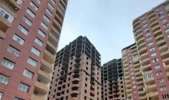 Binanın altında mərasim evi açılır: Sakinlər etiraz edir