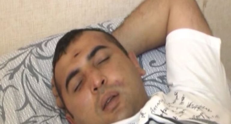 Azərbaycanda döyülən polisin görüntüləri