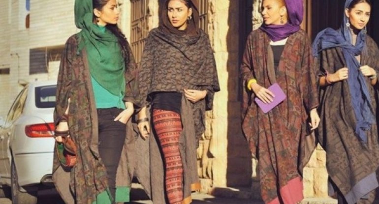 İran qadınları başlarını qırxdırır və kişi paltarı geyinirlər
