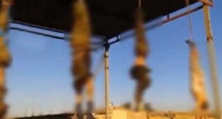 İŞİD 19 suriyalını ayağından asdı