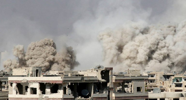 Suriyada beynəlxalq koalisiyanın hava hücumlarında 60 nəfər həlak oldu