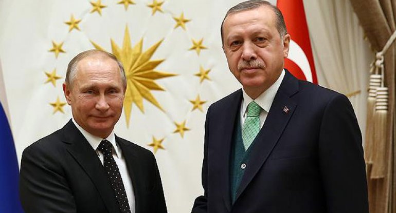 Putin Ərdoğanla Rusiyanın Suriyadakı hərbi bazalara hücum barədə danışdı