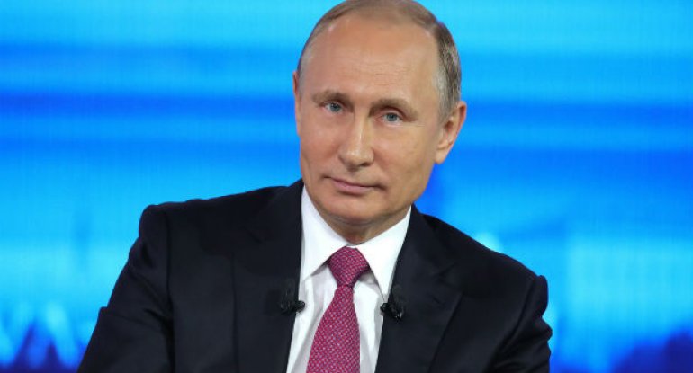 Putin Jak Şirakın dəfnində qadınla görüntüləndi