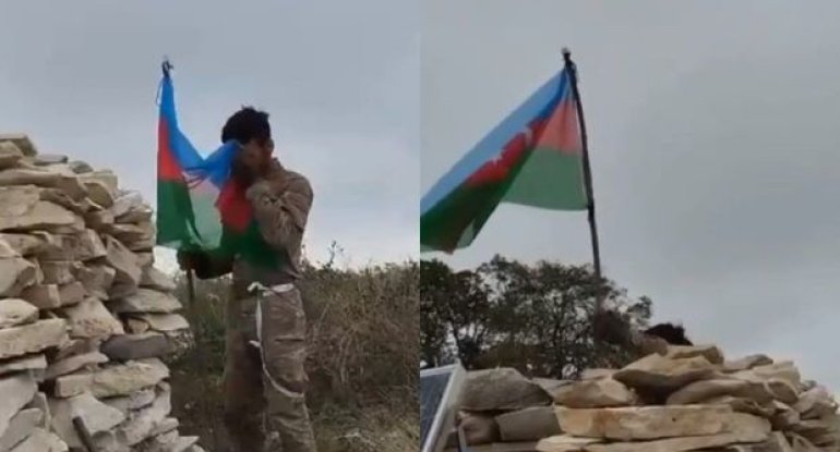 Əsgərimiz Xocalıya Azərbaycan Bayrağını sancdı - VİDEO
