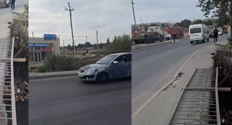 Bakıda kanalın üzərindən keçən yolun bir hissəsi çökdü, məhəccər aşdı - VİDEO