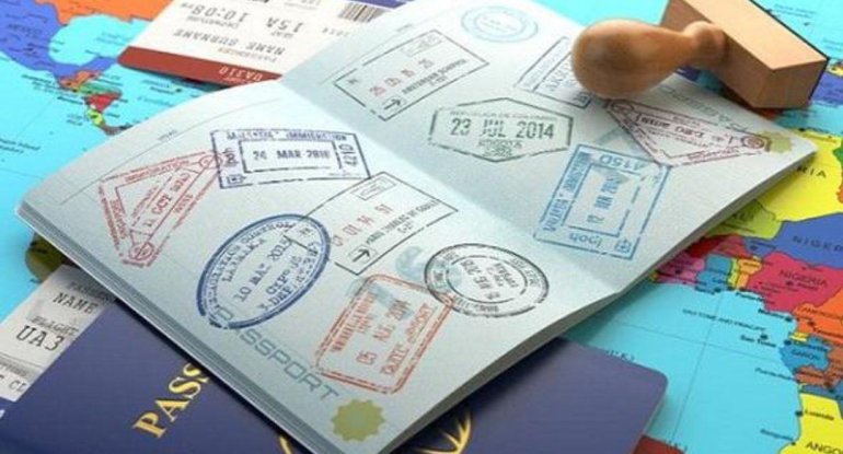 Pasport fotoşəkilinizdə niyə gülümsəyə bilməzsiniz? - Cavab sizi şoka salacaq