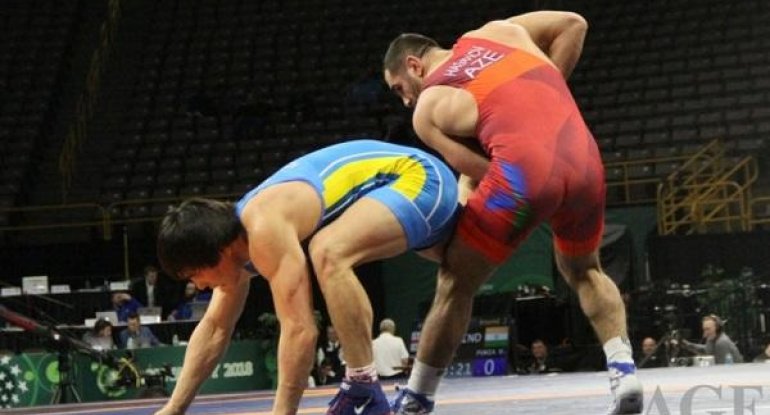 Olimpiya çempionunun iki medalı ləğv edildi