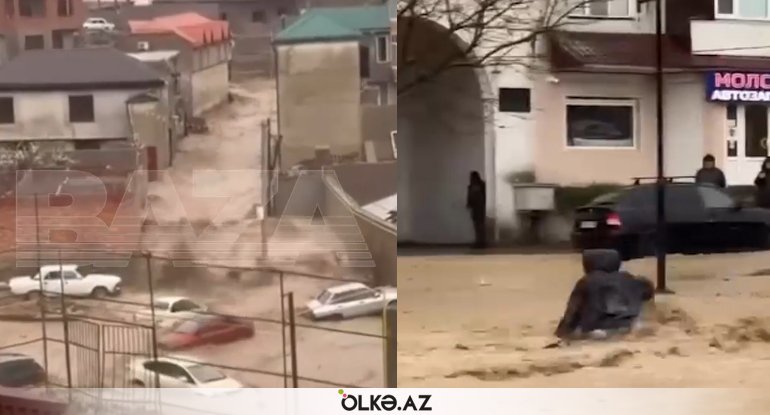 Dağıstanda insanları və maşınları su apardı - VİDEO